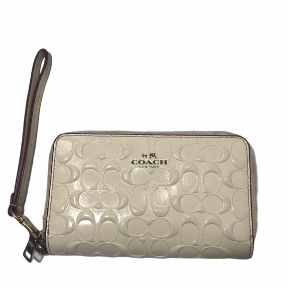 Coach debossed creamy white double zipper wristlet